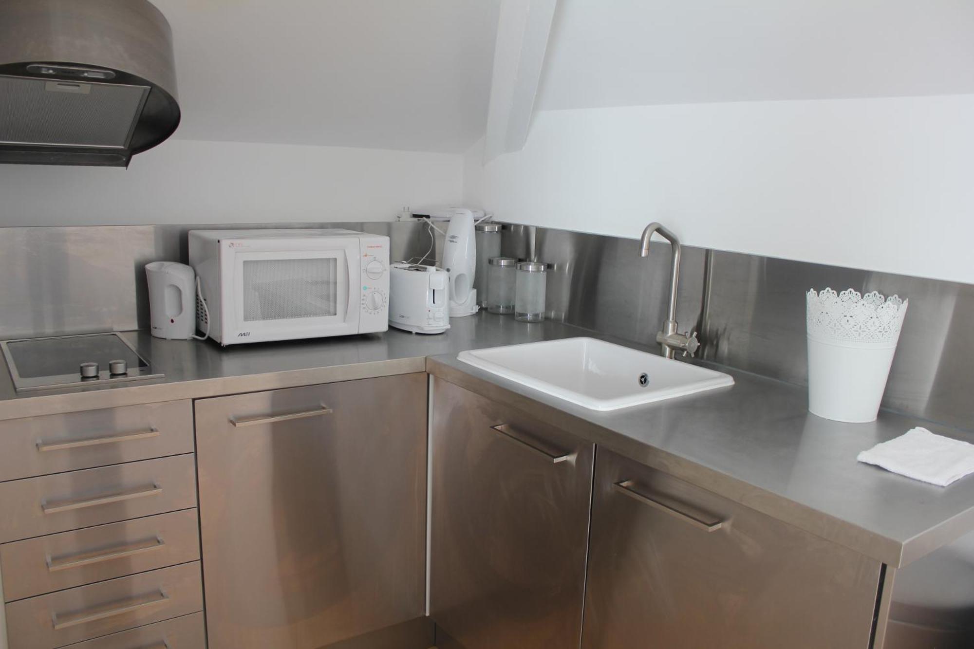 Portas Do Castelo Apartments Лиссабон Номер фото